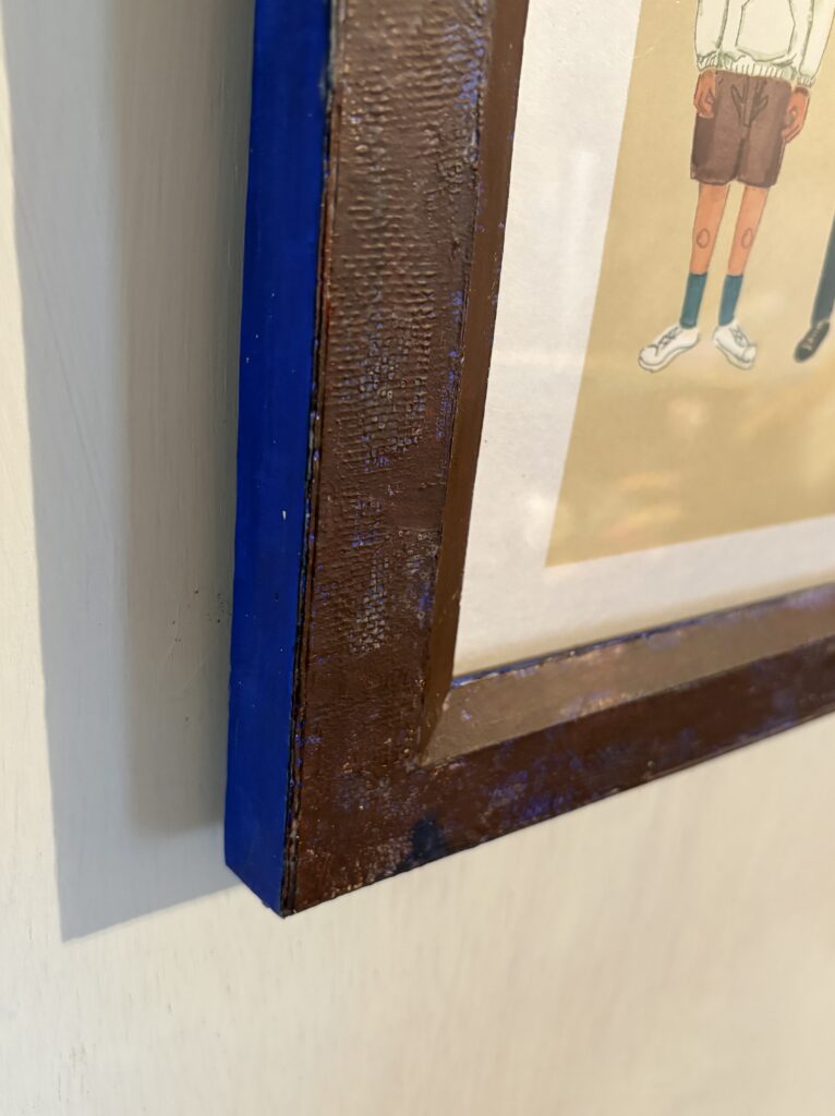 デジタルWall artの『Friends』にダンボールの額